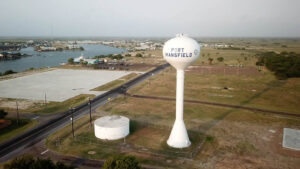 Port Mansfield water tower near coastal area.
